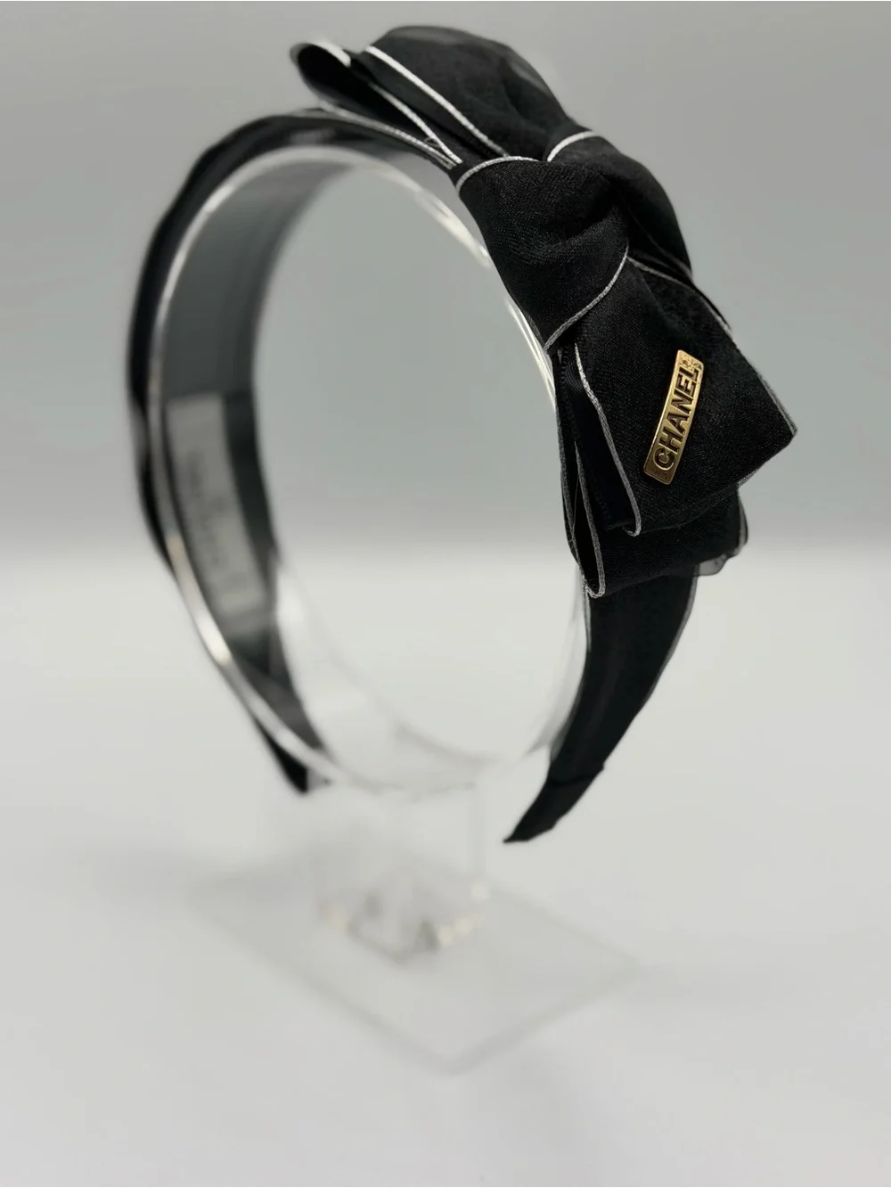 CHANEL Black Headband with Gold Logo Plaque